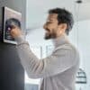 Smart home technology, wall system or man with digital dashboard screen for room lighting, safety s